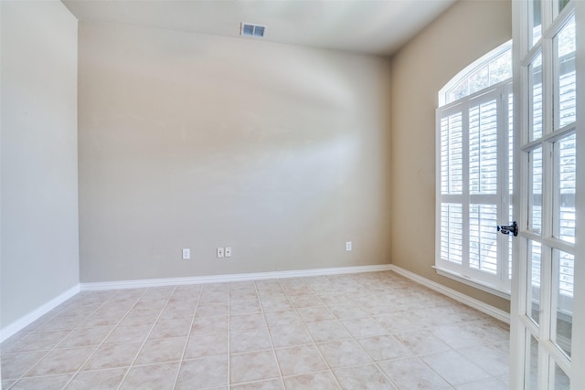 942 Lexington Dr, Rockwall, TX 75087 - empty room featuring baseboards, visible vents, and light tile patterned floors