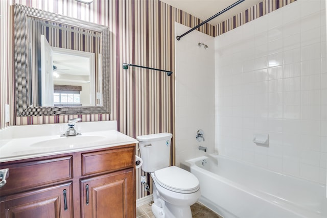 942 Lexington Dr, Rockwall, TX 75087 - bathroom featuring wallpapered walls, toilet, bathing tub / shower combination, vanity, and tile patterned flooring
