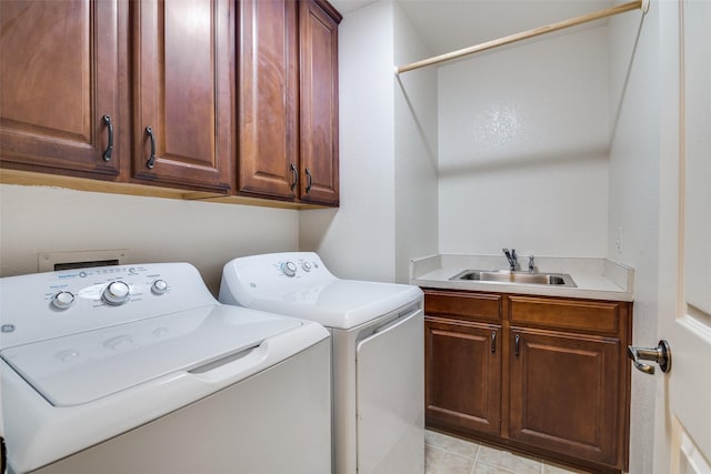 942 Lexington Dr, Rockwall, TX 75087 - laundry room with cabinet space, washer and clothes dryer, and a sink