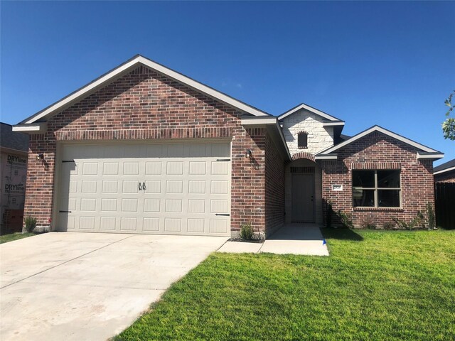 10169 Budtime Ln, Dallas, TX 75217 - ranch-style house featuring brick siding, an attached garage, driveway, and a front yard