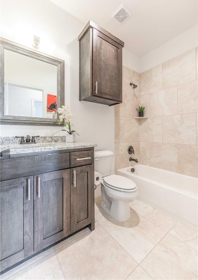 10169 Budtime Ln, Dallas, TX 75217 - bathroom with tile patterned flooring, vanity, bathtub / shower combination, toilet, and visible vents