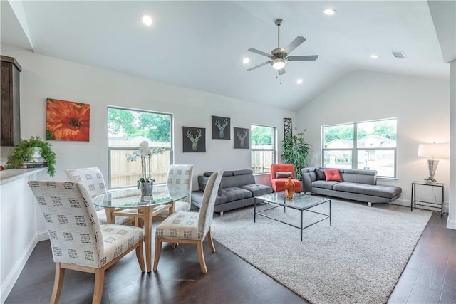 10169 Budtime Ln, Dallas, TX 75217 - living room with ceiling fan, baseboards, lofted ceiling, dark wood-type flooring, and visible vents
