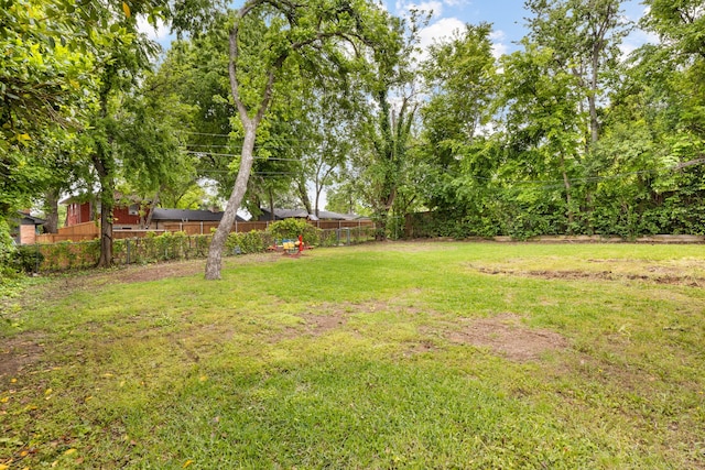 view of yard featuring fence