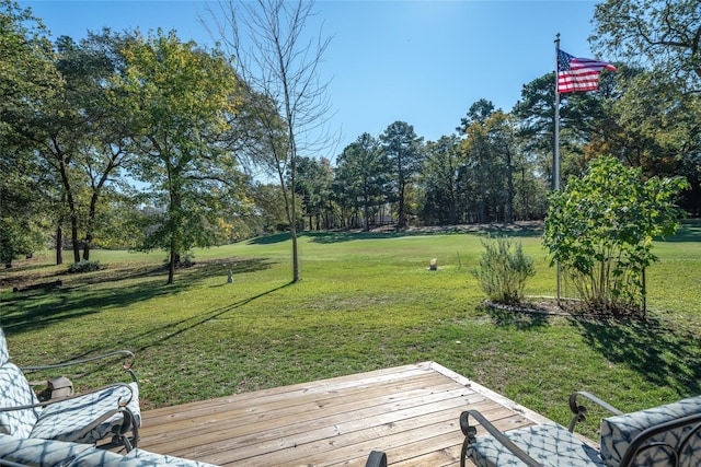 view of yard with a wooden deck
