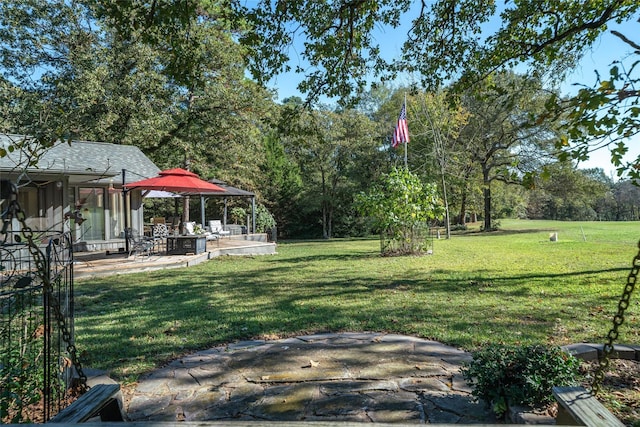 view of yard featuring a patio and a gazebo