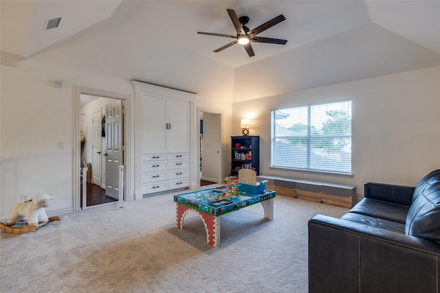 living area with visible vents, a ceiling fan, carpet, and high vaulted ceiling