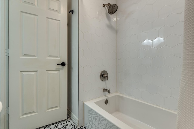 full bathroom featuring shower / tub combination and tile patterned flooring