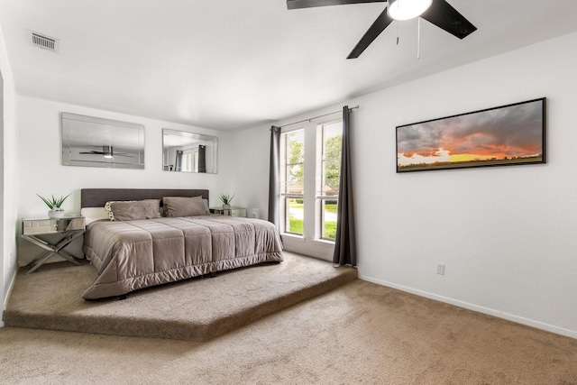 2409 Leslie St, Denton, TX 76205 - bedroom featuring baseboards, a ceiling fan, carpet flooring, and visible vents