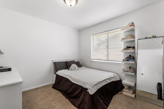 2409 Leslie St, Denton, TX 76205 - carpeted bedroom featuring baseboards