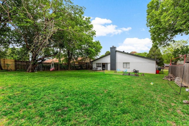 2409 Leslie St, Denton, TX 76205 - view of yard with a fenced backyard