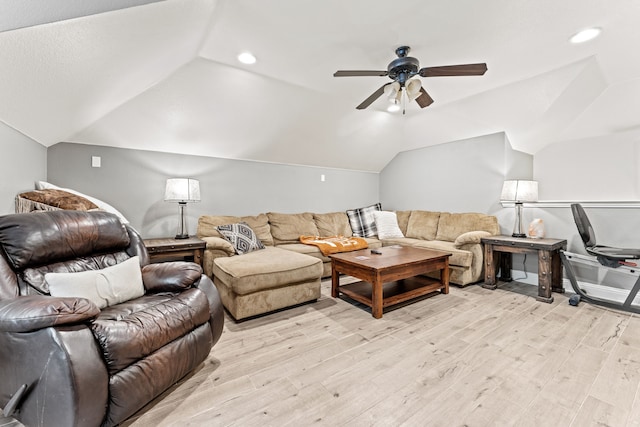 living room with lofted ceiling, light wood-type flooring, a ceiling fan, and recessed lighting