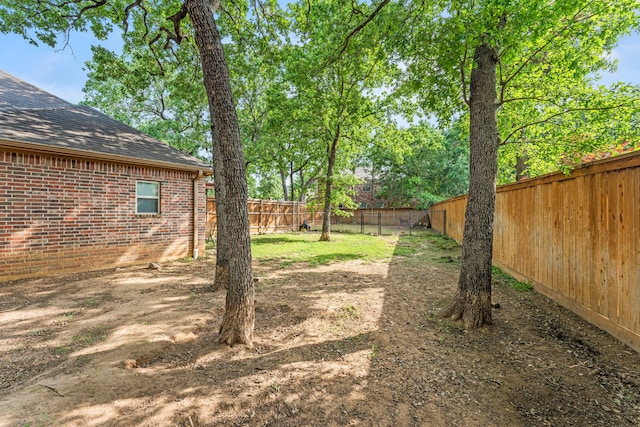 view of yard featuring a fenced backyard