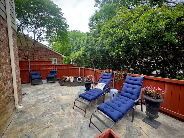 view of patio with a fenced backyard