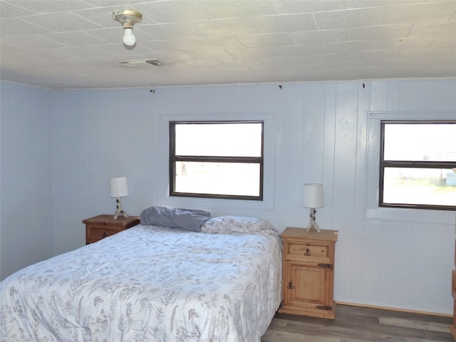 286 N Fm 1851, Voca, TX 76887 - bedroom featuring visible vents and wood finished floors