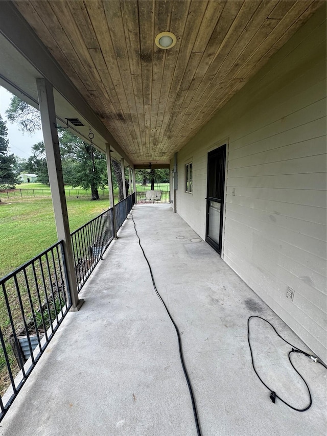 view of patio featuring a porch