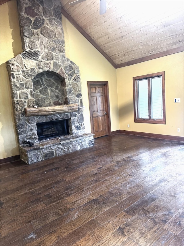 unfurnished living room with baseboards, wood-type flooring, and vaulted ceiling