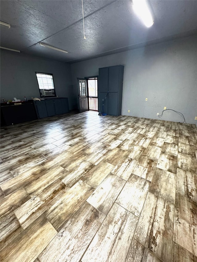 unfurnished room featuring hardwood / wood-style flooring