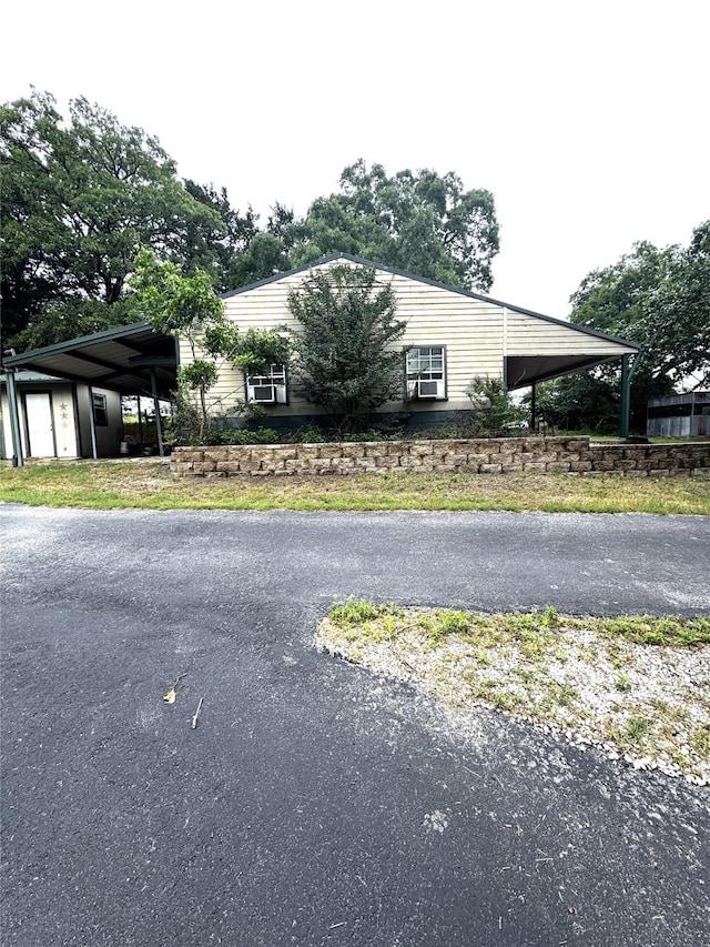 exterior space featuring an attached carport