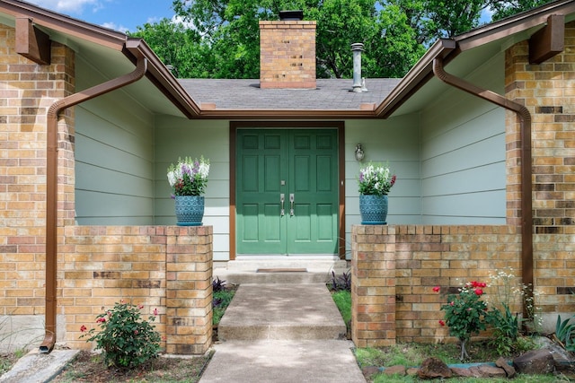 2403 Leslie St, Denton, TX 76205 - entrance to property featuring a chimney and roof with shingles
