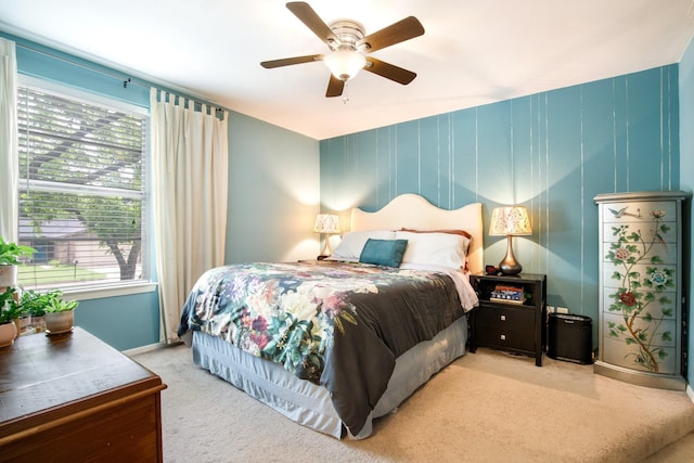 2403 Leslie St, Denton, TX 76205 - carpeted bedroom featuring multiple windows, baseboards, and ceiling fan