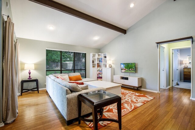 2403 Leslie St, Denton, TX 76205 - living area with wood finished floors, baseboards, and recessed lighting