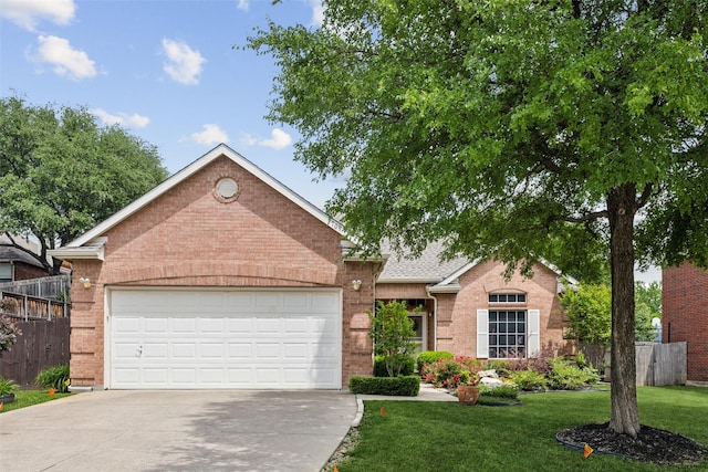 ranch-style home with brick siding, driveway, and a garage