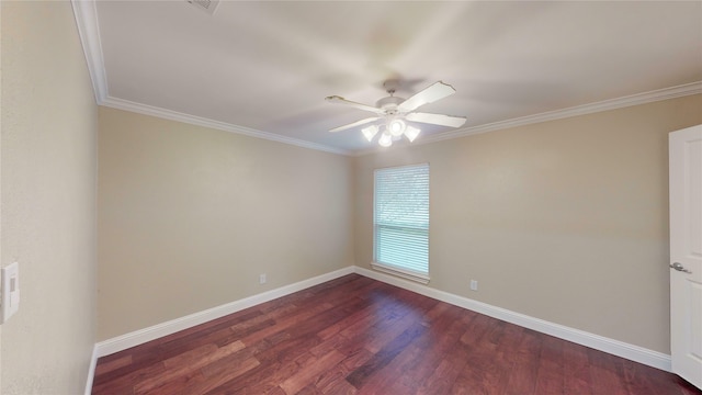spare room featuring crown molding, ceiling fan, baseboards, and dark wood finished floors