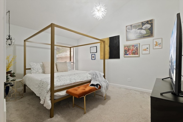 carpeted bedroom featuring baseboards and lofted ceiling