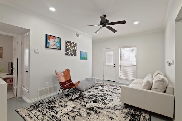 living area featuring crown molding, a ceiling fan, visible vents, and recessed lighting
