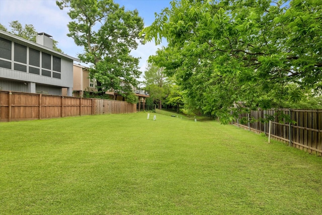view of yard with fence
