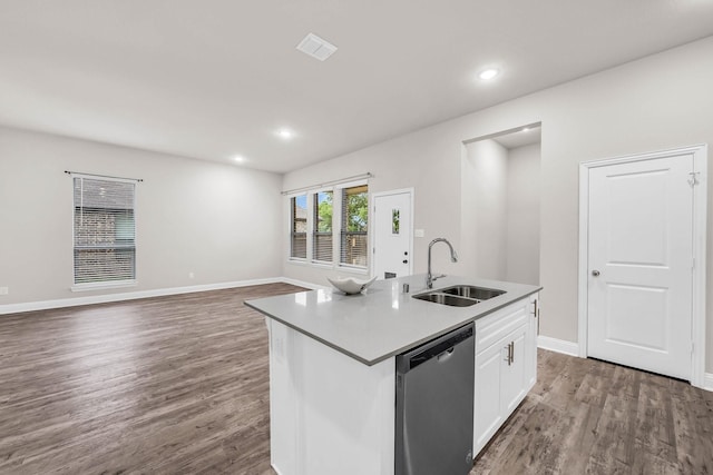 kitchen featuring a sink, white cabinetry, baseboards, dishwasher, and wood finished floors