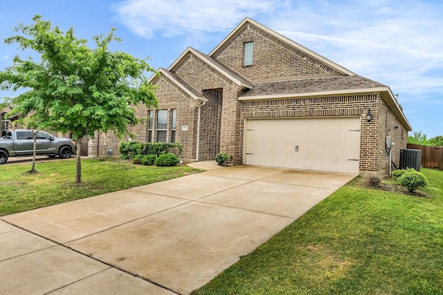 traditional-style house with a front yard, central air condition unit, brick siding, concrete driveway, and an attached garage
