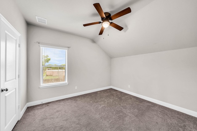 bonus room featuring carpet floors, ceiling fan, visible vents, baseboards, and lofted ceiling