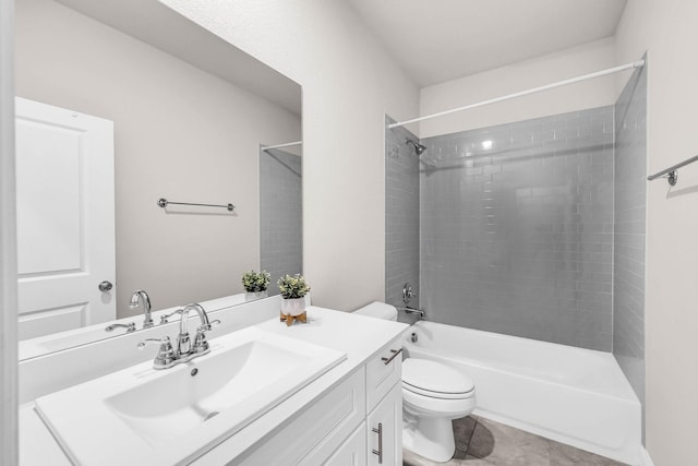 full bath with vanity, toilet,  shower combination, and tile patterned flooring