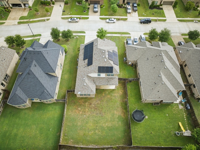 birds eye view of property with a residential view