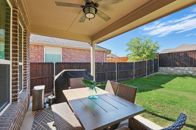 1146 Berrydale Dr, Northlake, TX 76226 - fenced backyard featuring a ceiling fan, area for grilling, and outdoor dining space