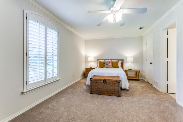 bedroom featuring multiple windows, crown molding, carpet flooring, baseboards, and a ceiling fan