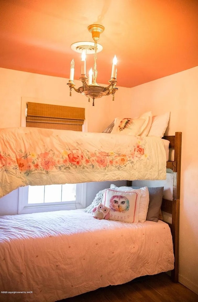 509 W 3rd St, Claude, TX 79019 - bedroom with wood finished floors