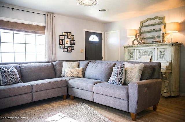 509 W 3rd St, Claude, TX 79019 - living room with visible vents and wood finished floors