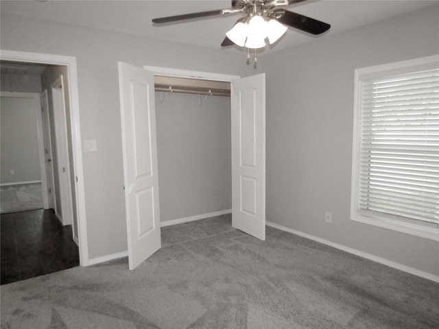 316 Tennessee St, Graham, TX 76450 - unfurnished bedroom with baseboards, ceiling fan, a closet, and carpet flooring