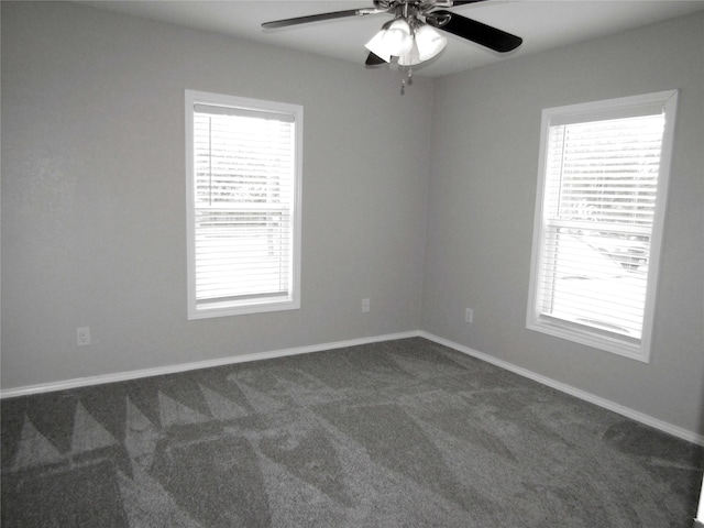 316 Tennessee St, Graham, TX 76450 - unfurnished room with baseboards, dark colored carpet, and ceiling fan