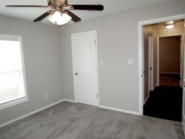 316 Tennessee St, Graham, TX 76450 - carpeted spare room with ceiling fan and baseboards