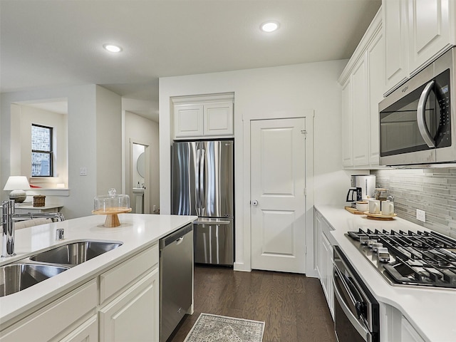 1267 Casselberry Dr, Flower Mound, TX 75028 - kitchen featuring recessed lighting, white cabinets, stainless steel appliances, and dark wood-style flooring