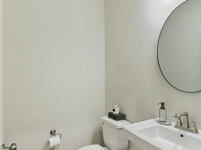 1267 Casselberry Dr, Flower Mound, TX 75028 - bathroom featuring a sink and toilet