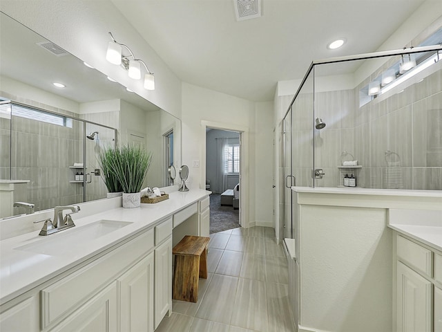 1267 Casselberry Dr, Flower Mound, TX 75028 - bathroom with visible vents, a wealth of natural light, and vanity