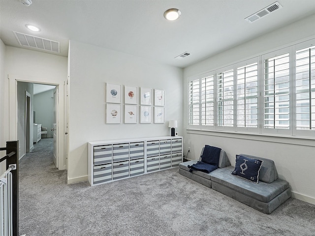 1267 Casselberry Dr, Flower Mound, TX 75028 - sitting room featuring baseboards, visible vents, and carpet