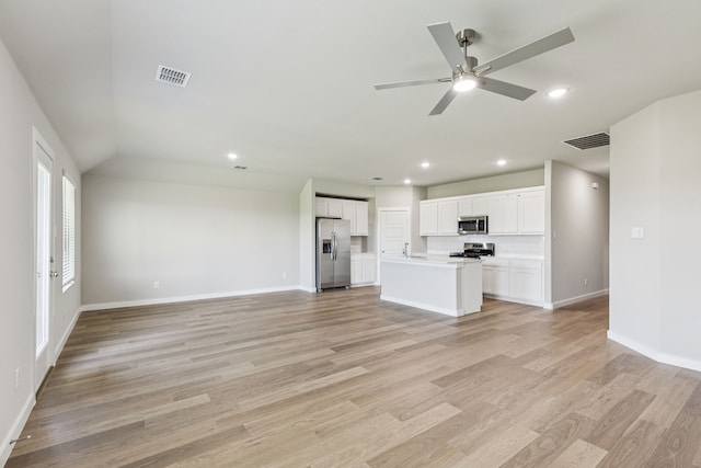6517 Colt Ranch Rd, Fort Worth, TX 76036 - unfurnished living room with recessed lighting, light wood-type flooring, ceiling fan, and vaulted ceiling