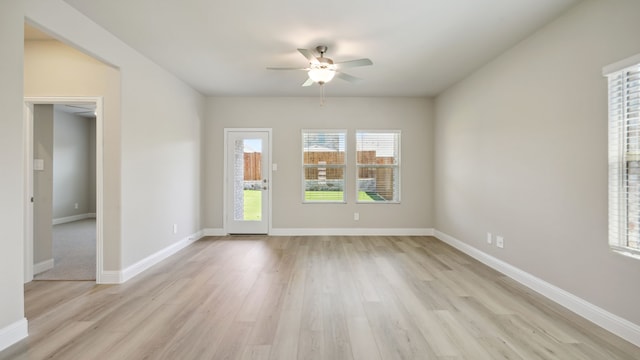 418 Ezra Ln, Mckinney, TX 75069 - spare room featuring ceiling fan and light wood finished floors