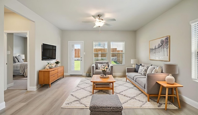418 Ezra Ln, Mckinney, TX 75069 - living room with a ceiling fan and light wood finished floors