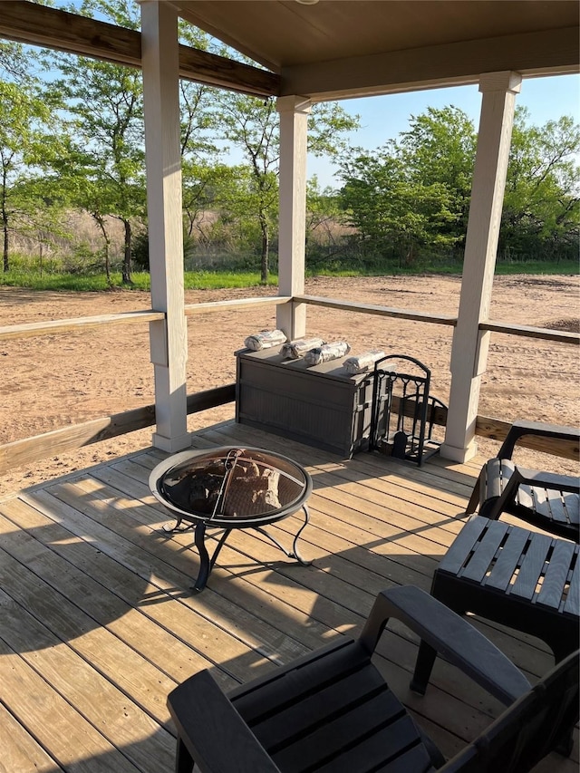 124 Greenhill Cir, Nocona, TX 76255 - deck with an outdoor fire pit